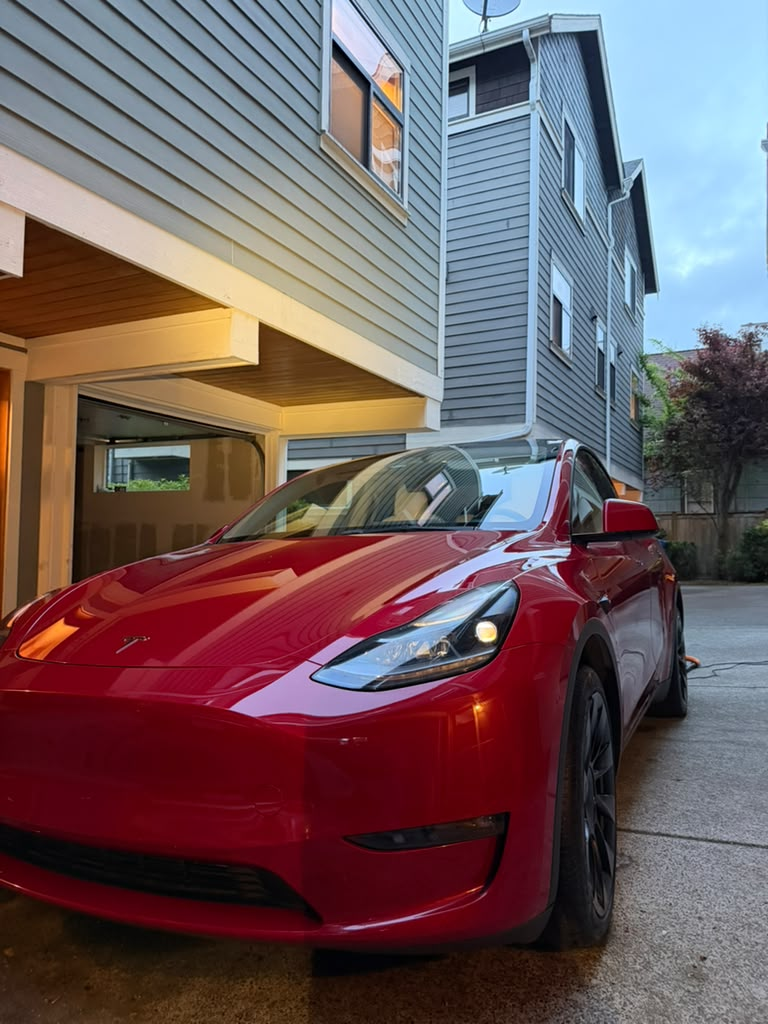 Red Tesla Model Y exterior after detailing
